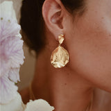Aretes pétalos dobles