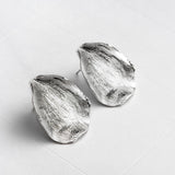 Aretes pétalos grandes